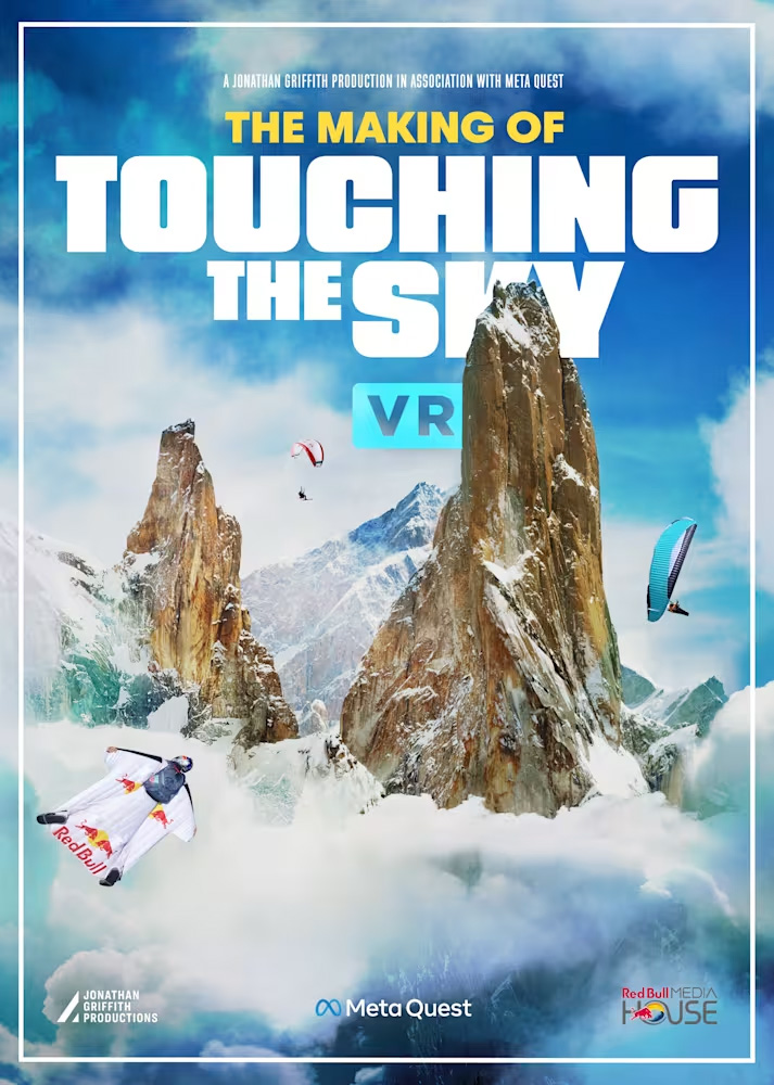 Touching the Sky VR poster: paragliders and a wingsuit pilot around a snow-capped summit.